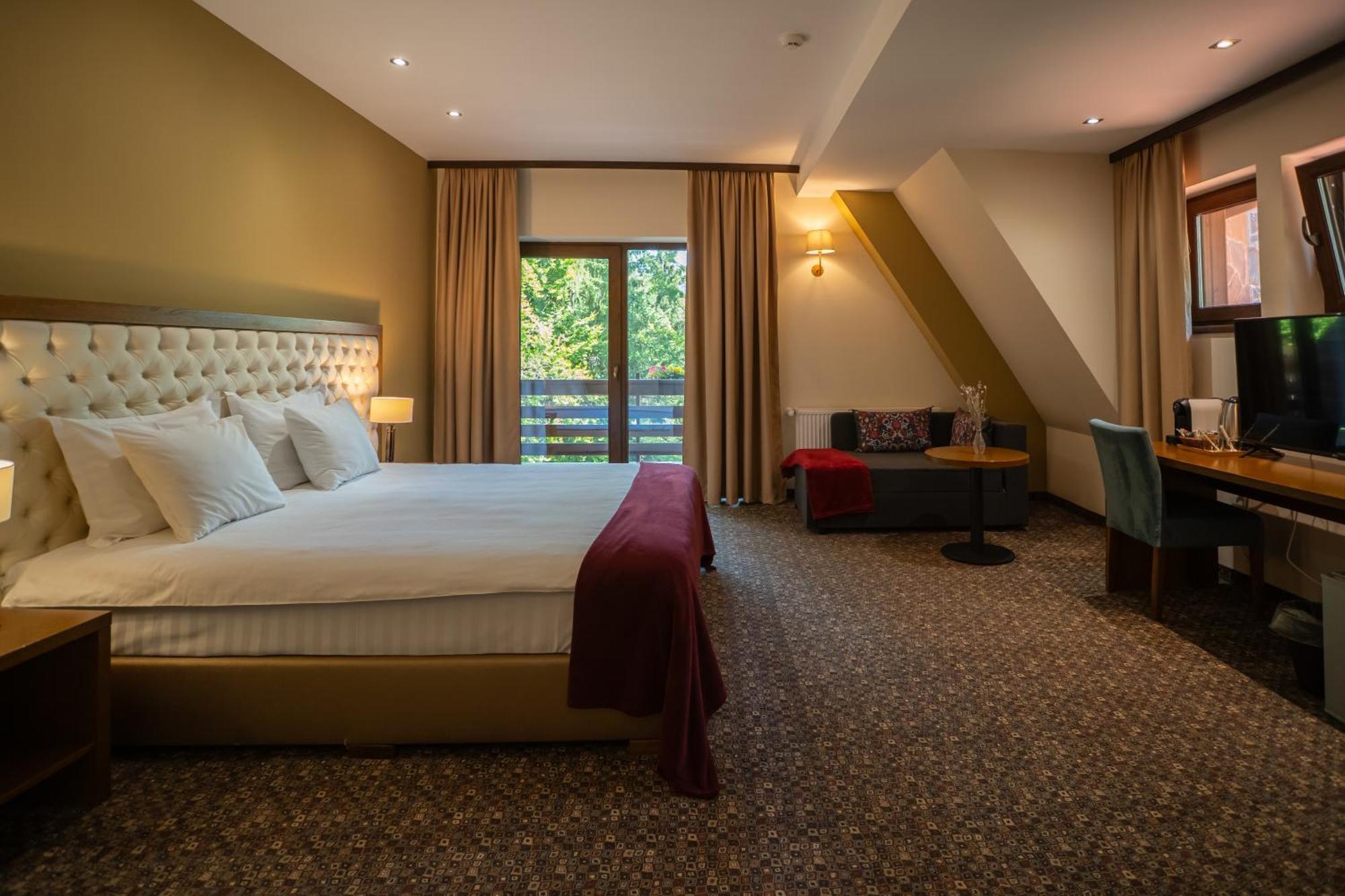 Opus Villa ซินายา ภายนอก รูปภาพ A room at the hotel